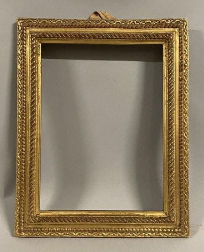 Pair of small carved and gilded oak frames...