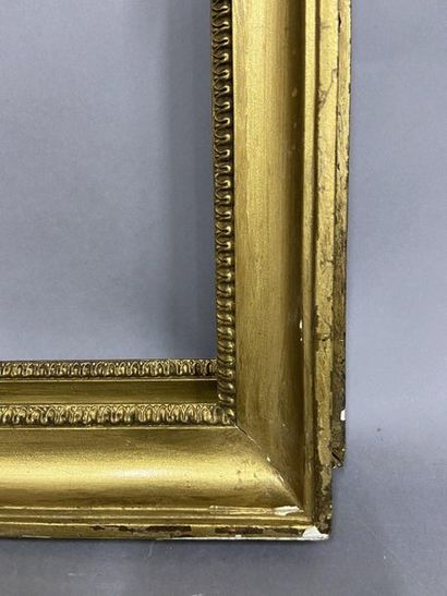Paire de baguettes en bois et pâte mouluré...