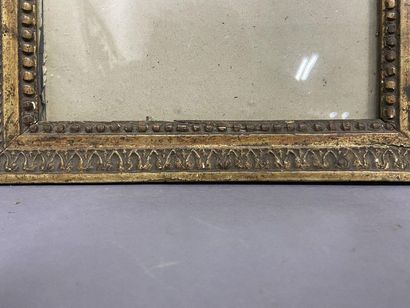 Baguette en bois sculpté et anciennement...