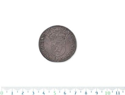 LOT:
Half shield with a long wick. 1653....