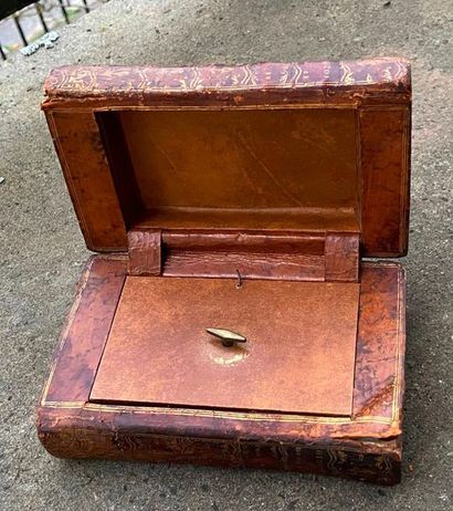 Music box in the shape of a book, trompe...