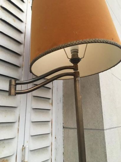 Gold-plated metal tripod reading light, resting...