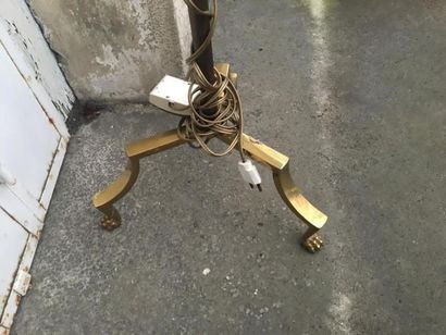 Gold-plated metal tripod reading light, resting...