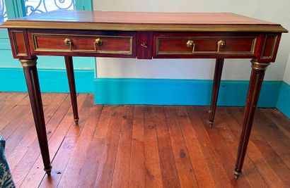 A Louis XVI style flat desk with two drawers,...
