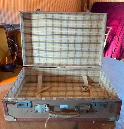 A large suitcase

90 x 54 x 32 cm 

Another...