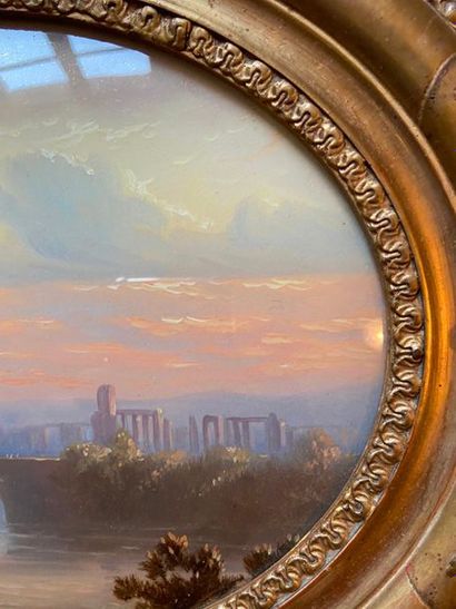 Two oval landscapes fixed under glass

18...