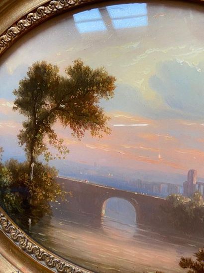 Two oval landscapes fixed under glass

18...