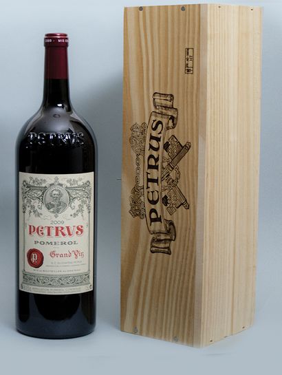 A magnum of PETRUS Pomerol 2009 in a wooden...