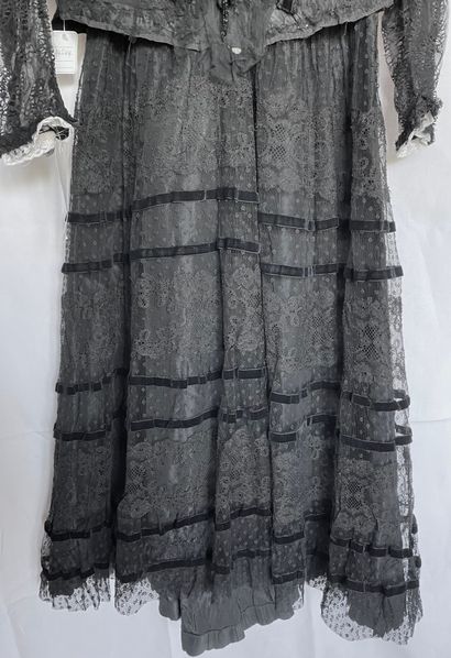 A Black silk and tulle ensemble with black...