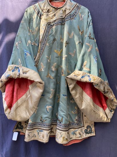A Ladies' jacket in verdigris silk embroidered...