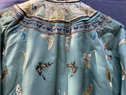 A Ladies' jacket in verdigris silk embroidered...