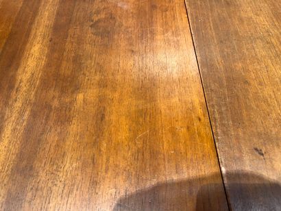 Turned wood cabinet legs and metal braces....