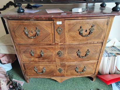 Rosewood veneered chest of drawers opening...