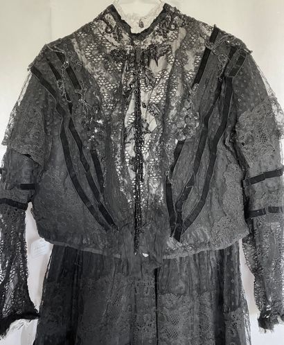 A Black silk and tulle ensemble with black...