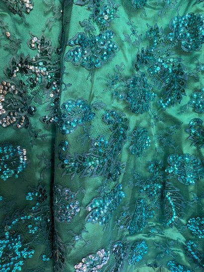 Long dress in green silk and green tulle...
