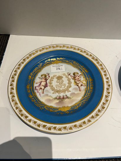 Pair of porcelain plates in the Sèvres style,...