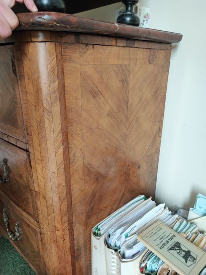 Rosewood veneered chest of drawers opening...