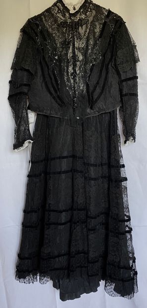 A Black silk and tulle ensemble with black...