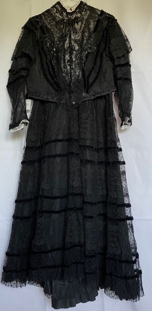 A Black silk and tulle ensemble with black...