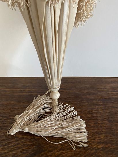Umbrella, cream ottoman and handle carved...