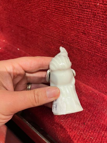 CHINE
Figurine représentant un coq en porcelaine...