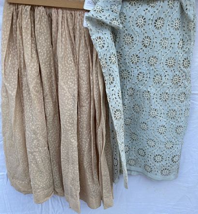 M Lot including:
-Ivory satin skirt, black...