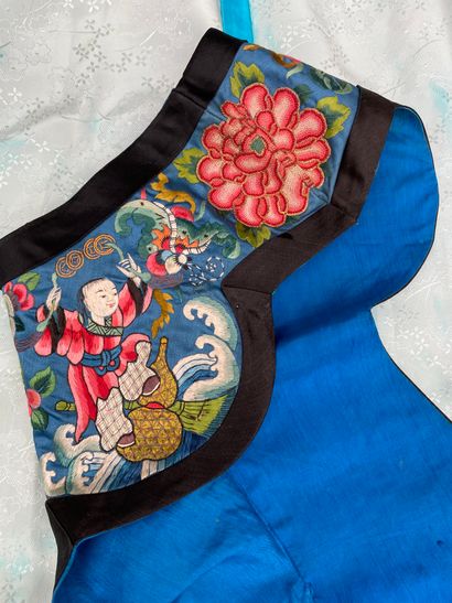 Black fabric jacket with blue piping, long...