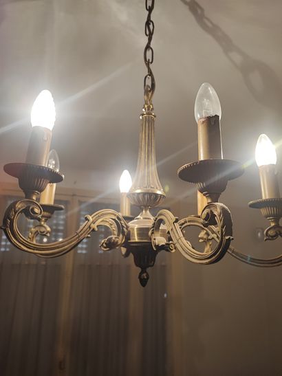 Pair of Louis XVI style six-light chandeliers....