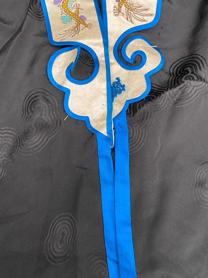 Black fabric jacket with blue piping, long...