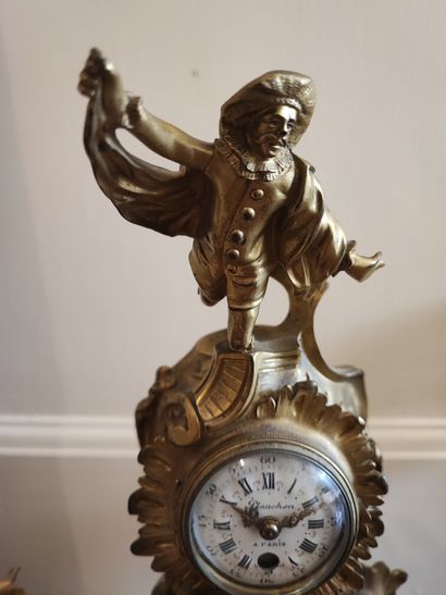 Petite pendule en bronze doré de style Rocaille...