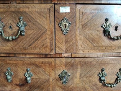 Rosewood veneered chest of drawers opening...