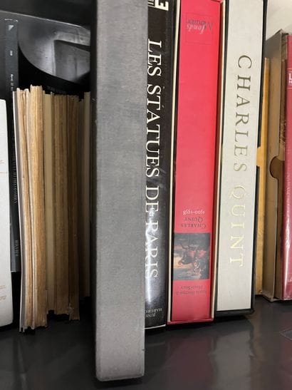 Two cases of art volumes including Charles...
