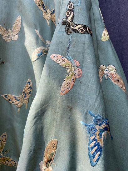A Ladies' jacket in verdigris silk embroidered...