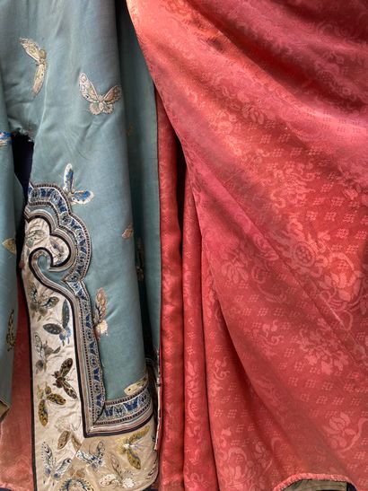 A Ladies' jacket in verdigris silk embroidered...