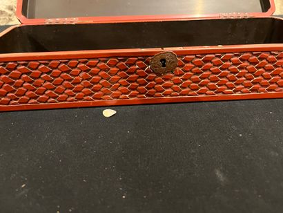 CHINA
Two red lacquer boxes, one decorated...