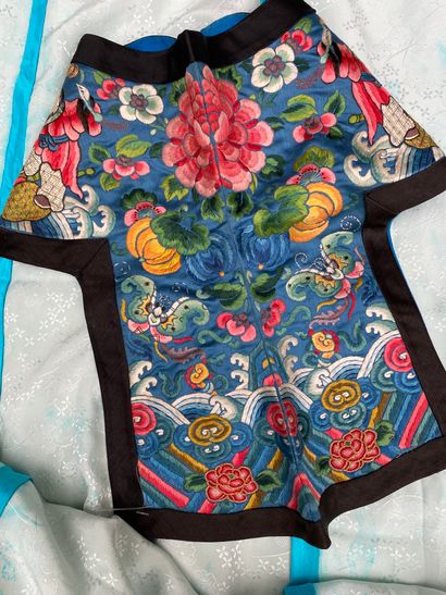 Black fabric jacket with blue piping, long...