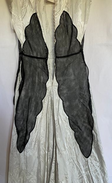 A Black silk and tulle ensemble with black...