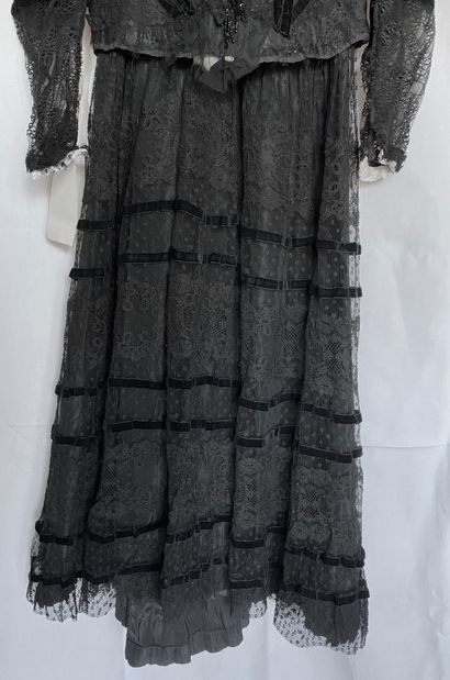 A Black silk and tulle ensemble with black...