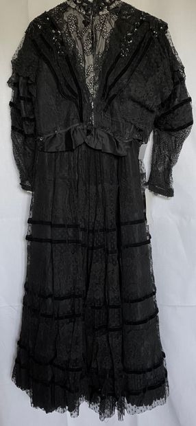 A Black silk and tulle ensemble with black...