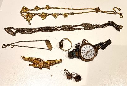 Lot en or 585 et 750°/°° comprenant : 
Broche...