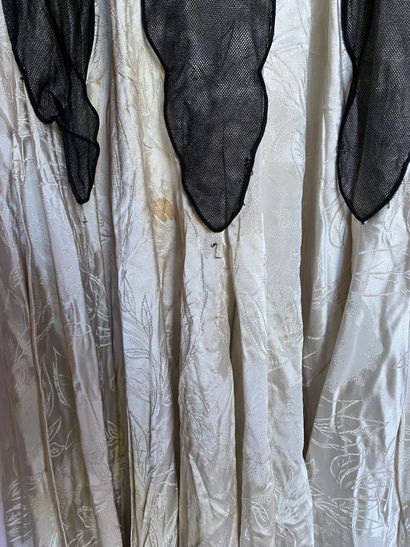 A Black silk and tulle ensemble with black...