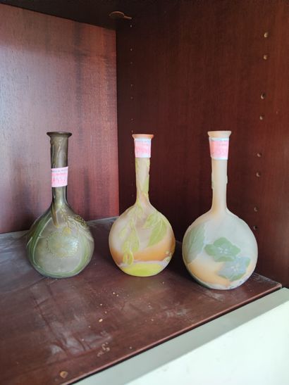 Dans le gout de Gallé. Quatre vases soliflores....