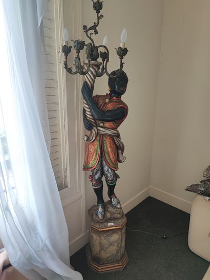 Pair of Nubian light holders in lacquered...