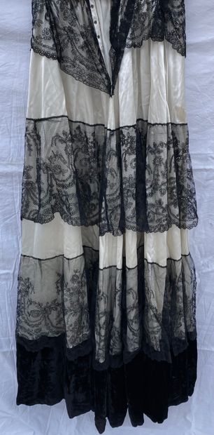 M Lot including:
-Ivory satin skirt, black...