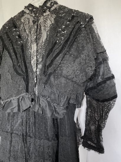 A Black silk and tulle ensemble with black...