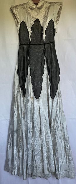 A Black silk and tulle ensemble with black...