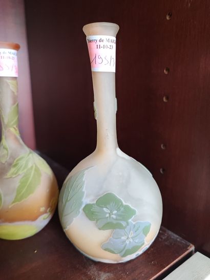 Dans le gout de Gallé. Quatre vases soliflores....