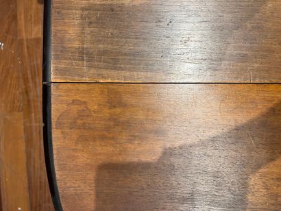 Turned wood cabinet legs and metal braces....