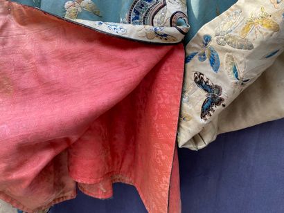 A Ladies' jacket in verdigris silk embroidered...