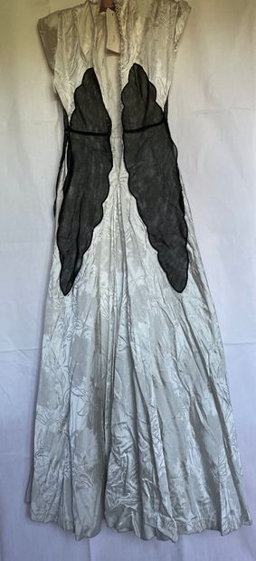 A Black silk and tulle ensemble with black...